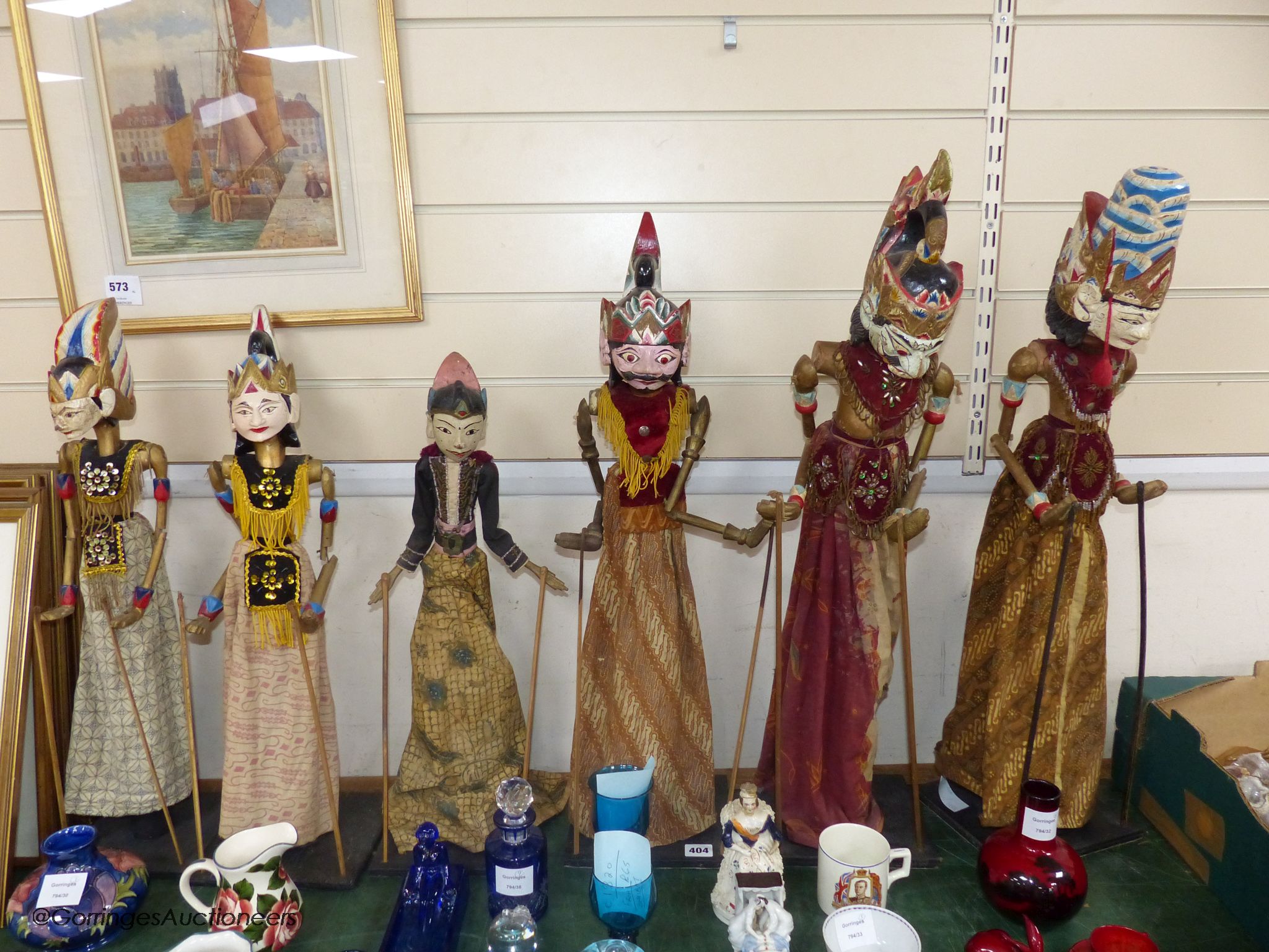 A collection of Indonesian stick puppets, tallest 76cm